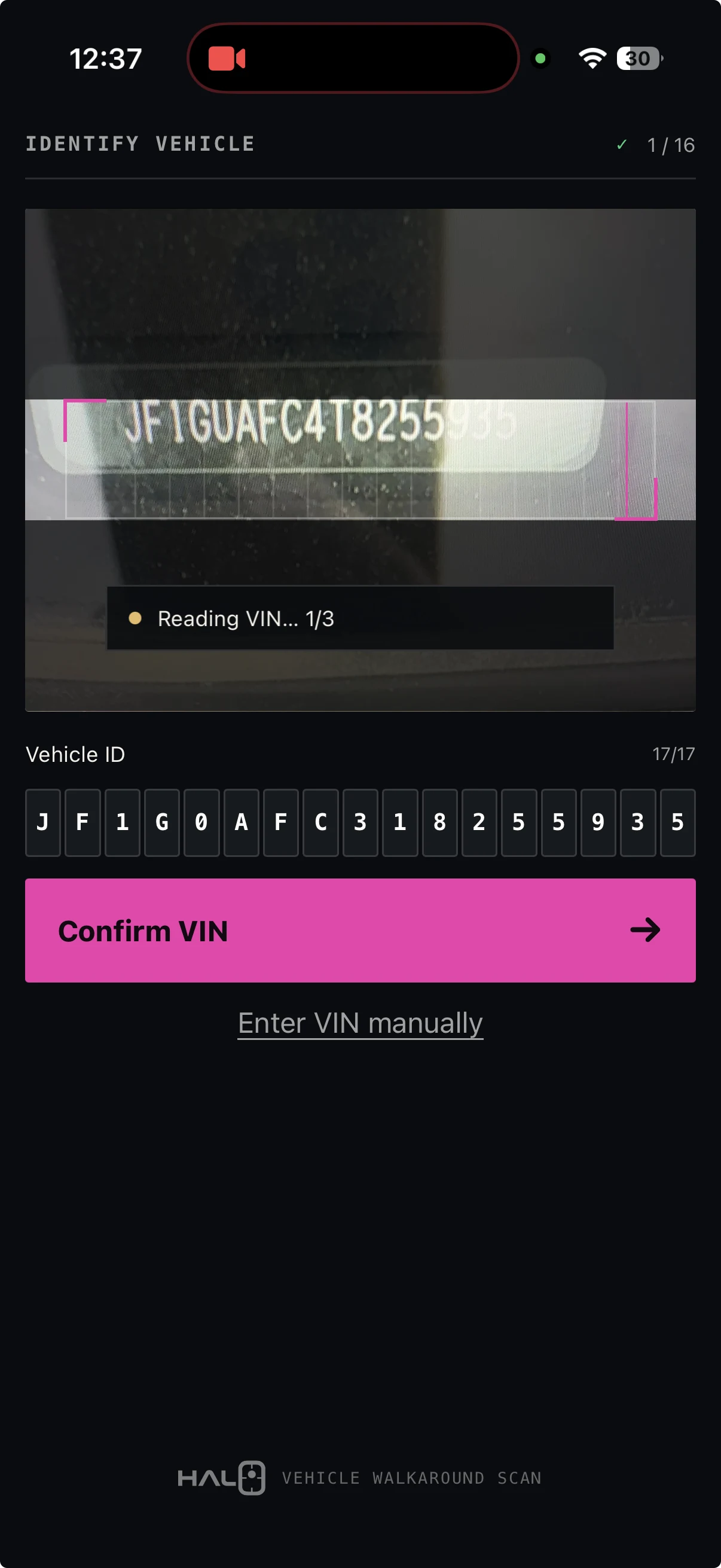 Current Halo VIN scanner framing a real vehicle VIN through the windshield.